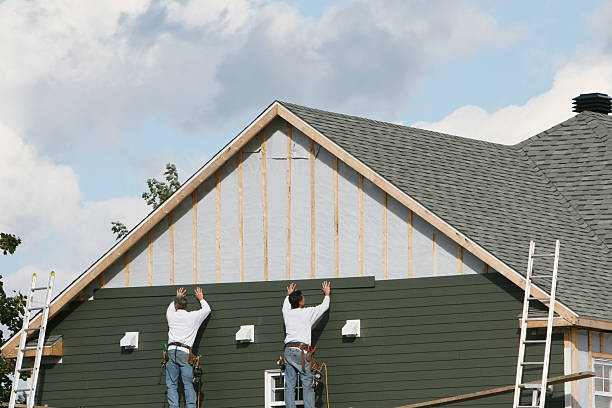 Professional Emergency Siding Repair technician working in Hudson, CO
